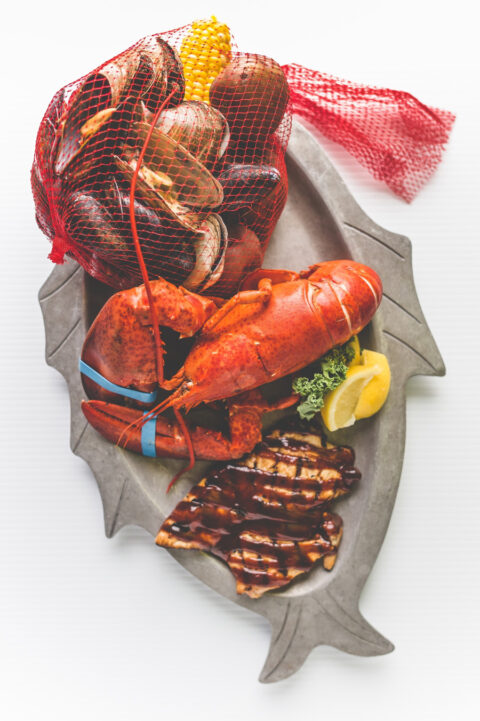 Seafood on a fish-shaped platter